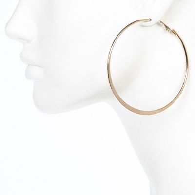 Gold tone medium flat bottom hoop earrings